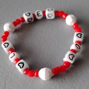 Red and White Beaded Bracelet with Heart Accents